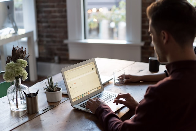 man working at laptop